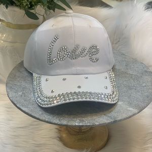 Brand new gorgeous white Love bling hat with silver tone embellishments